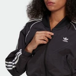 Women's Adidas Originals Adicolor Classics Cropped Track Jacket Black BLACK 14 Women's Adidas Originals Adicolor Classics Cropped Track Jacket Black BLACK -women‘s Sales Store GN2791 APP on model detail 1 gradient