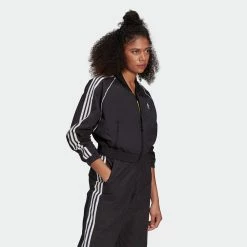 Women's Adidas Originals Adicolor Classics Cropped Track Jacket Black BLACK 11 Women's Adidas Originals Adicolor Classics Cropped Track Jacket Black BLACK -women‘s Sales Store GN2791 APP on model walking gradient